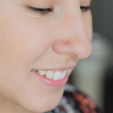 orange nose stud|More.